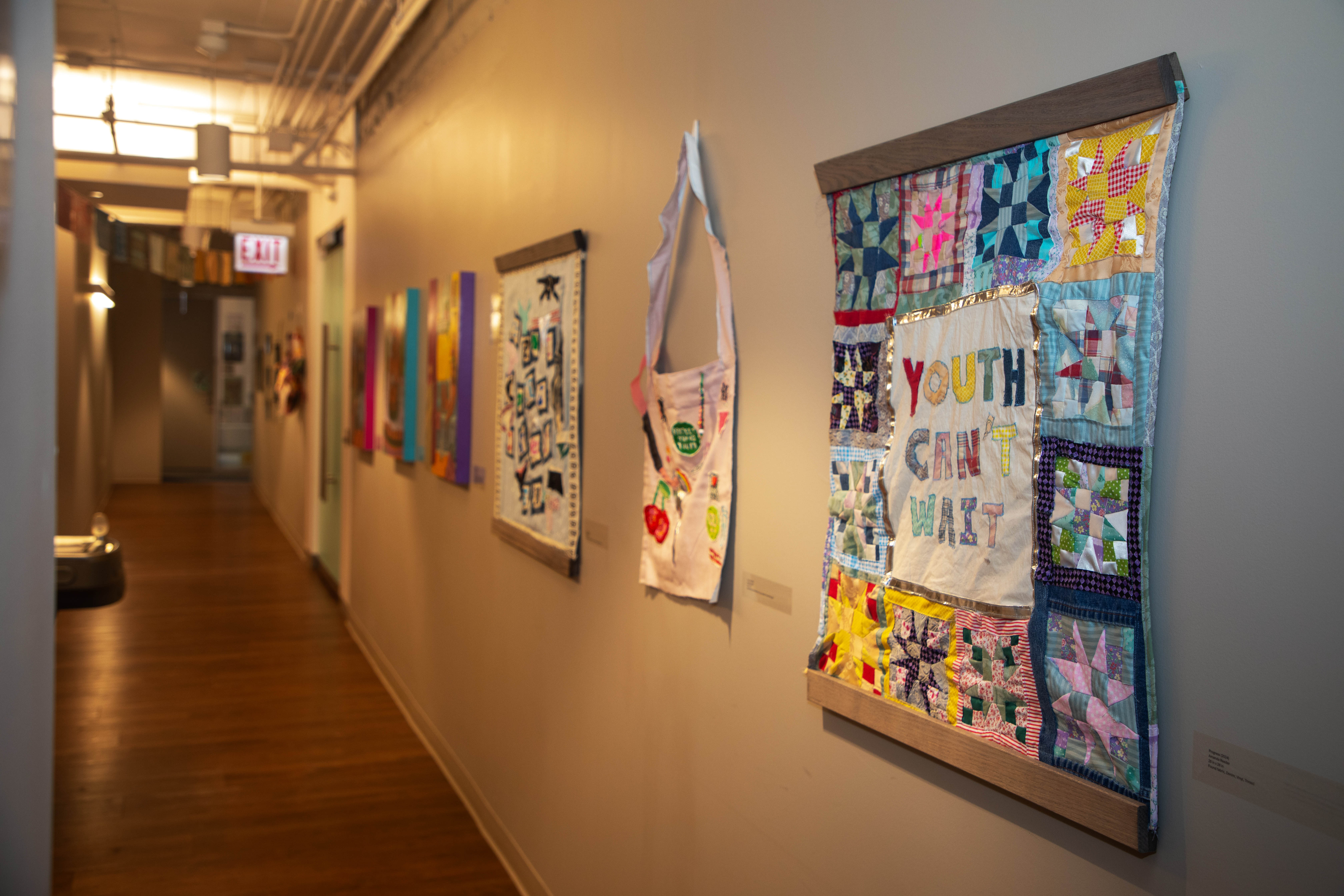 gallery wall with art hanging